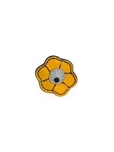Load image into Gallery viewer, A small yellow flower-shaped pin with a gray center.