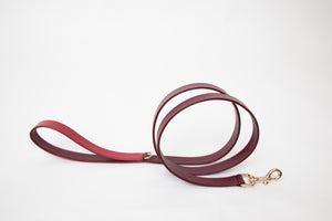 La dorada burgundy leather dog leash with red leather handle and gold plated hardware