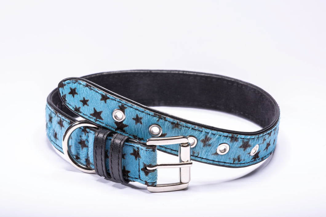 leather dog collar, blue collar with black stars. Has nickel hardware. Size small.